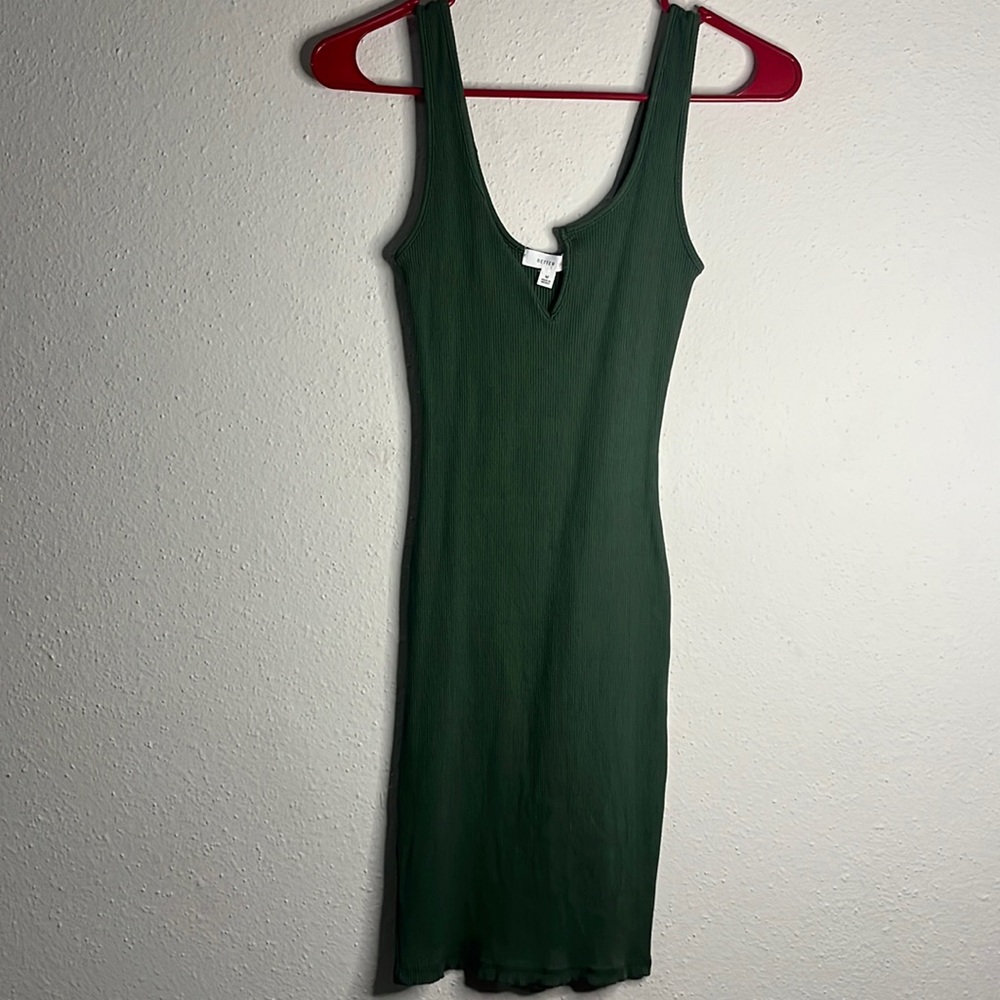 Green form fitting mid dress